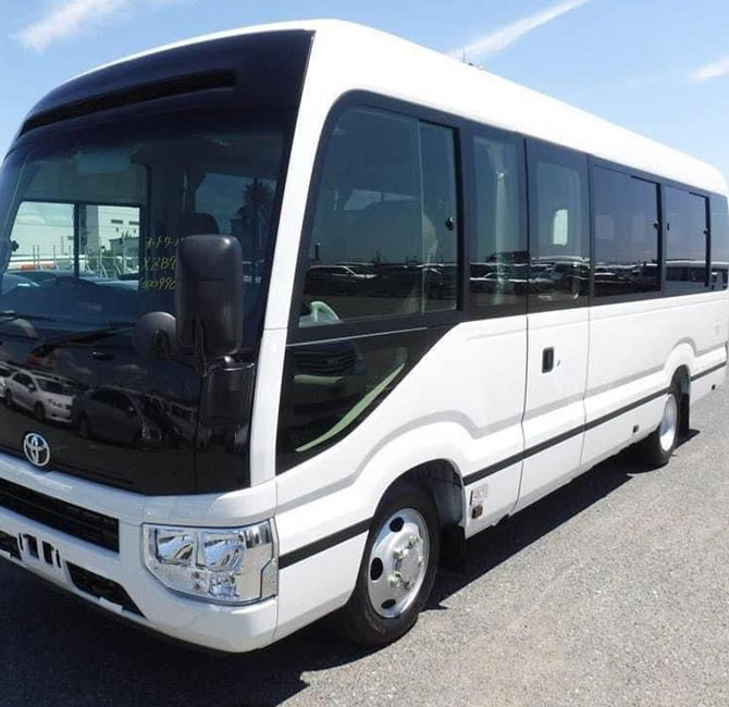 toyota coaster luxury coach hire in delhi