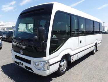 13 seater toyota coaster imported van on rent india